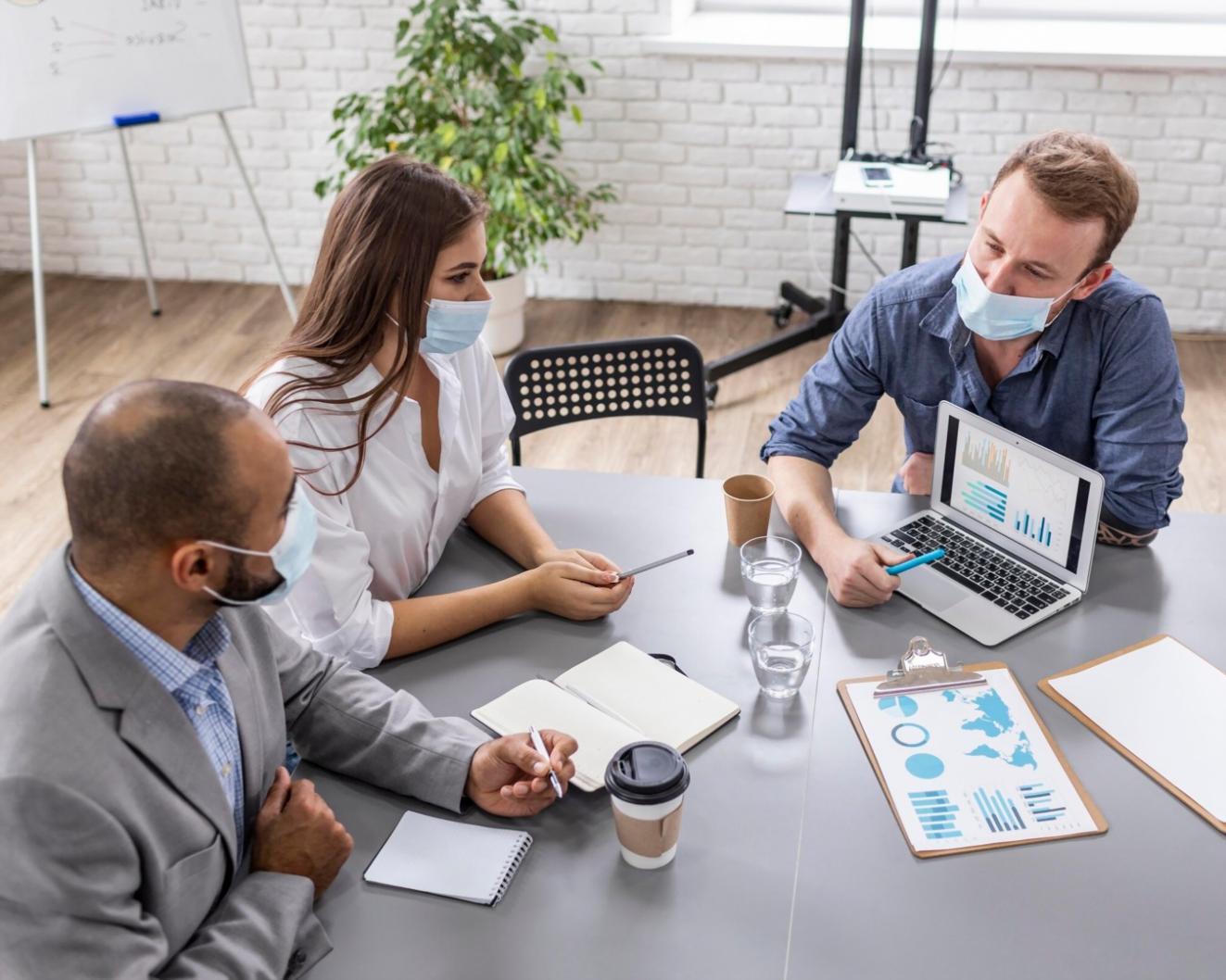 Financial professional reviewing budget documents at workspace